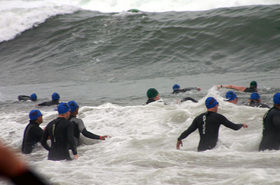 triathletes-swimming-in-waves-by-GasMunky.jpg