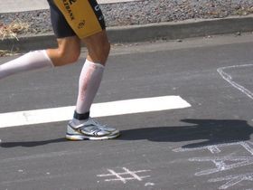 runner-wearing-compression-socks-by-triitalian.jpg